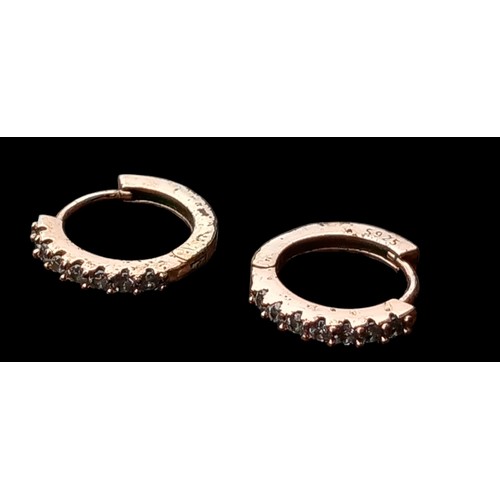 514 - A PAIR OF GOLD ON SILVER HOOP EARRINGS