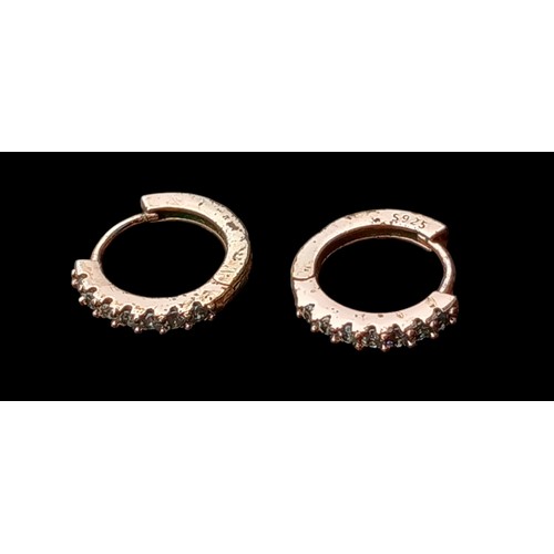 514 - A PAIR OF GOLD ON SILVER HOOP EARRINGS