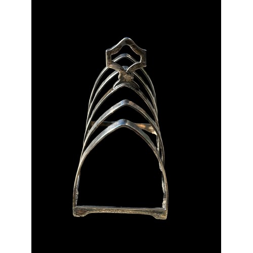 517 - A SHEFFIELD SILVER NEAT SIZED TOAST RACK