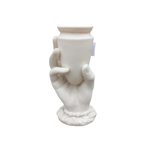 524 - AN UNGLAZED PORCELAIN HAND HOLDING VASE (POSSIBLY WORCESTER) KITE MARKED FOR 1864