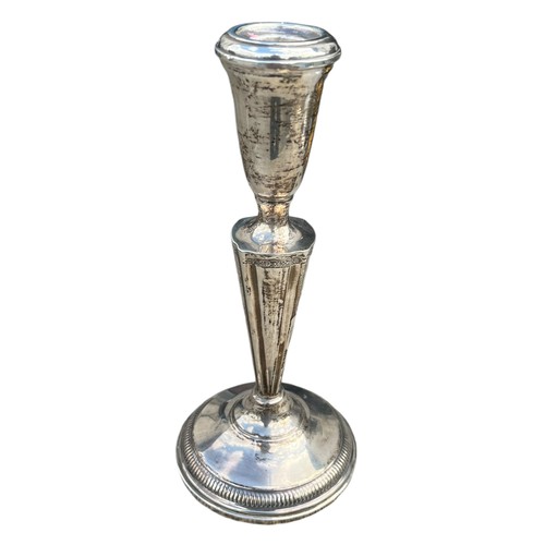 528 - A SILVER CANDLESTICK