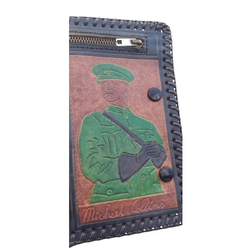 531 - A MICHAEL COLLINS LEATHER WALLET BELIEVED TO BE A LONG KESH WORK