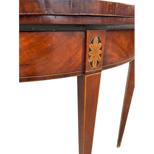 372 - A GEORGIAN INLAID CARD TABLE ON TAPERING GATE LEGS