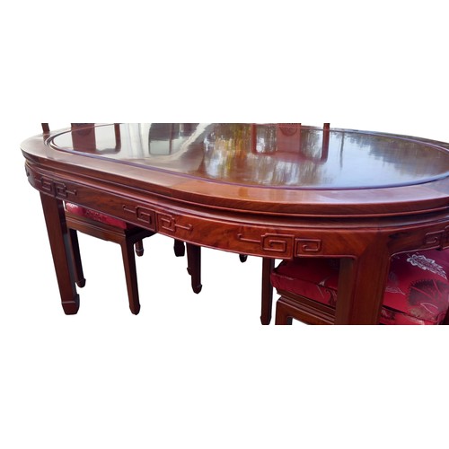 164A - AN ORIENTAL OVAL ROSEWOOD TABLE ND 4 CHAIRS