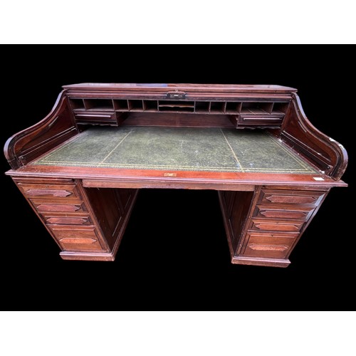 479 - A BEAUTIFUL ANTIQUE OAK ROLL TOP DESK OF LARGE PROPORTIONS WITH DEEP DRAWERS IN GOOD CONDITION MEASU... 