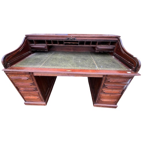 479 - A BEAUTIFUL ANTIQUE OAK ROLL TOP DESK OF LARGE PROPORTIONS WITH DEEP DRAWERS IN GOOD CONDITION MEASU... 