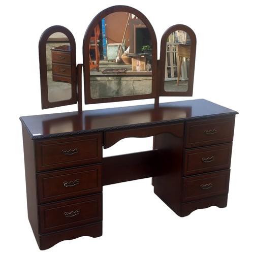 47 - A MAHOGANY KNEEHOLE DRESSING CHEST WITH GULL WING MIRRORS