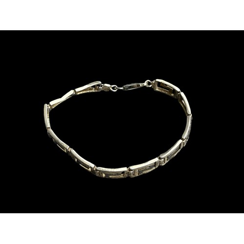 215 - A SILVER GREEK KEY BRACELET