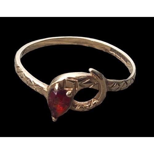 219 - A 9CT GOLD SNAKE RING SET WITH A SUNSTONE