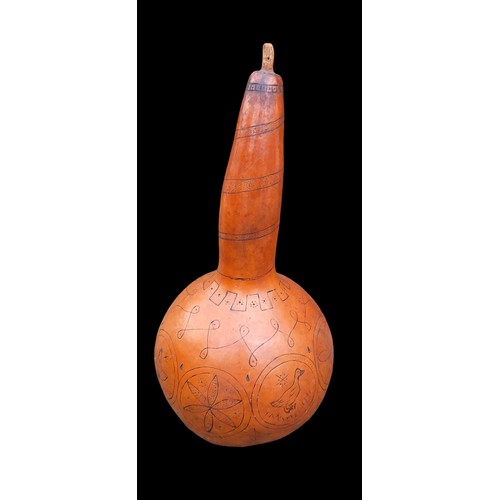 57 - AN AUTHENTIC CARVED AFRICAN CALABASH RATTLE