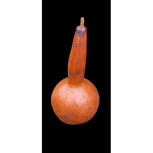 57 - AN AUTHENTIC CARVED AFRICAN CALABASH RATTLE