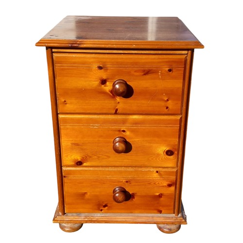 58 - A PINE 3 DRAWER BEDSIDE CHEST