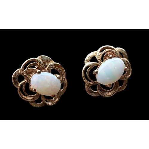 228 - A  PAIR OF 9ct GOLD OPAL SET EARRINGS