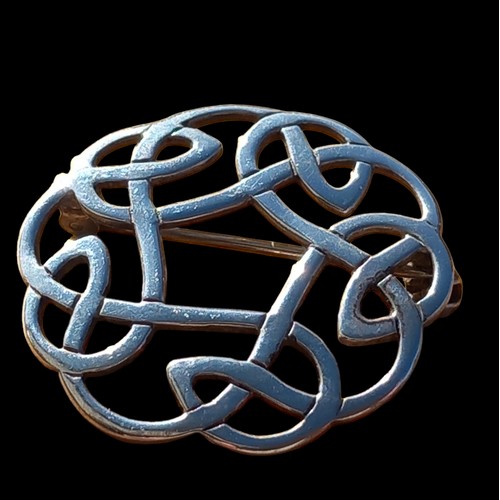 240 - A SILVER CELTIC BROOCH