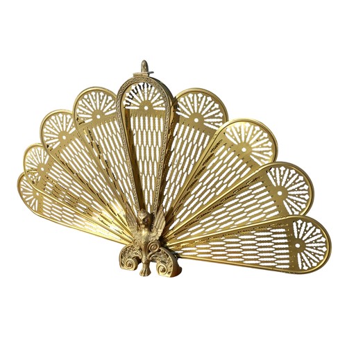 104 - A VINTAGE BRASS PEACOCK FIRESCREEN