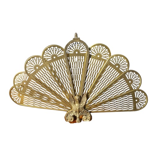 104 - A VINTAGE BRASS PEACOCK FIRESCREEN