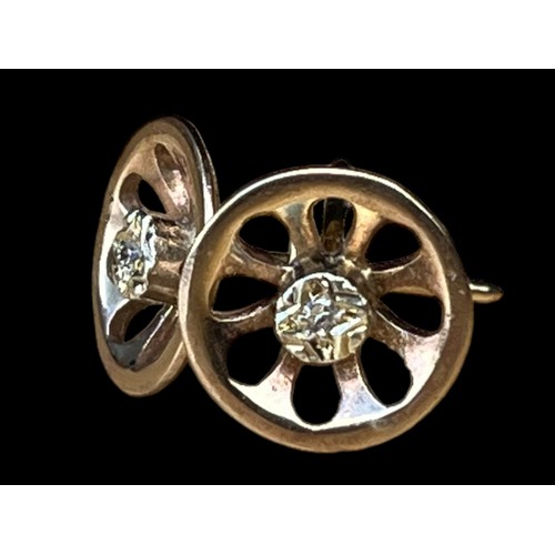 243 - A PAIR OF 9ct ROSE GOLD  OPENWORK  EARRINGS SET WITH DIAMONDS ON STEMS