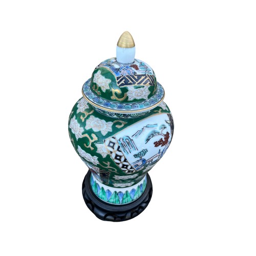 119 - A HAND PAINTED ORIENTAL  TEMPLE JAR ON STAND