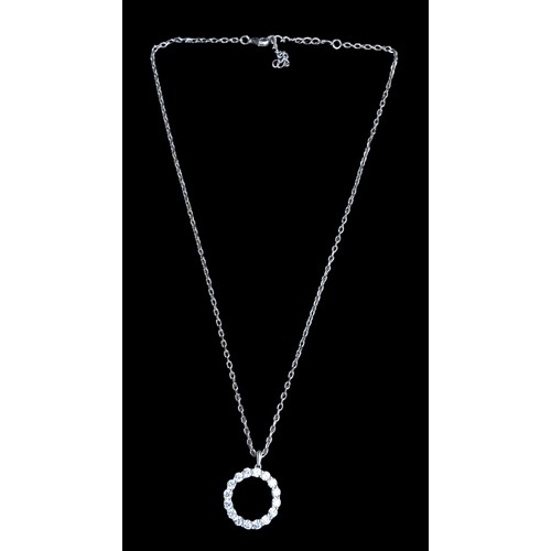 195 - A SILVER GEMSET CIRCULAR PENDANT ON SILVER CHAIN