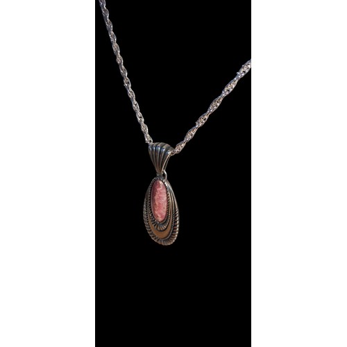 200 - A DESIGNER SILVER PENDANT ON SILVER CHAIN