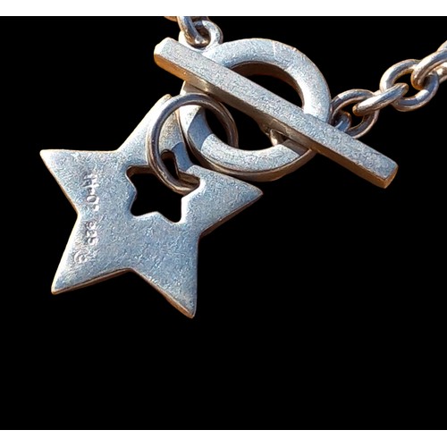 201 - A SILVER BAR BRACELET WITH A SILVER STAR