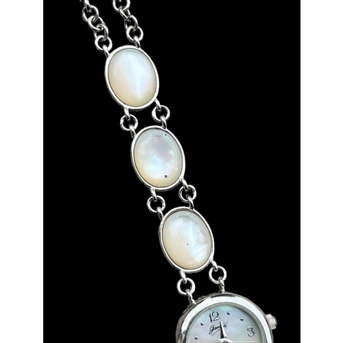 202 - A SILVER QUARTZ WATCH WITH MOTHER OF PEARL