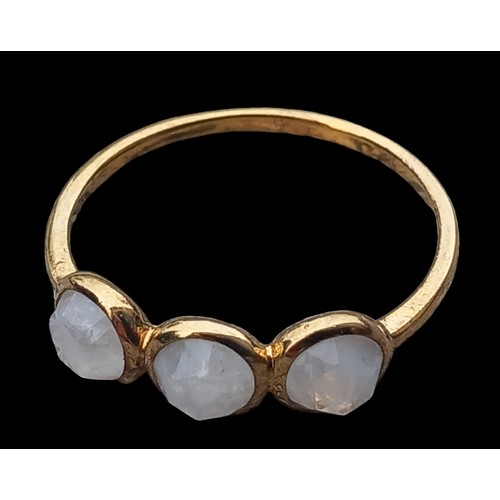 182 - A SILVER GILT MOONSTONE STYLE RING