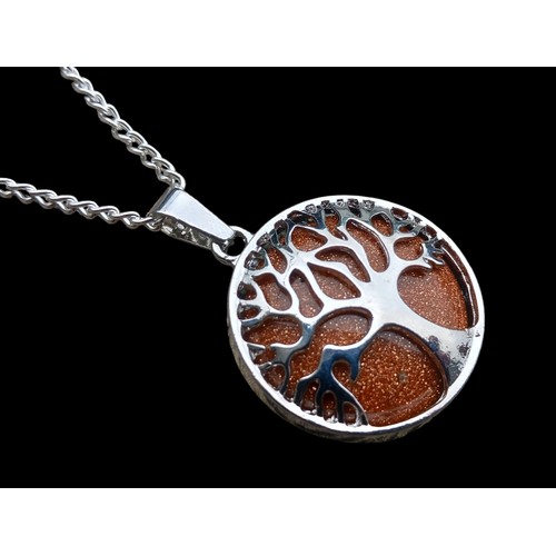 185 - A TREE OF LIFE PENDANT ON SILVER CHAIN