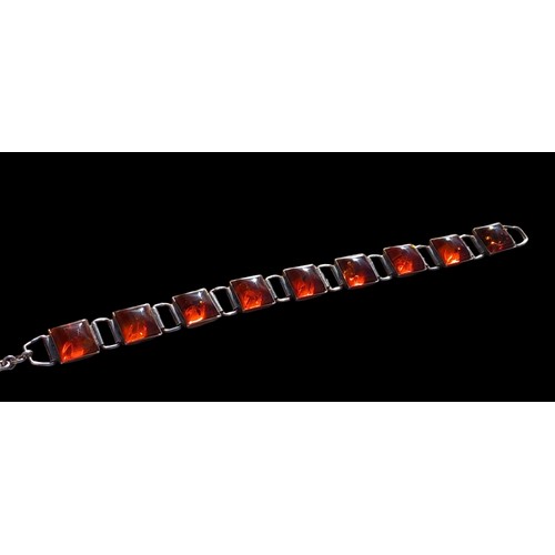 190 - A SILVER AND AMBER BRACELET