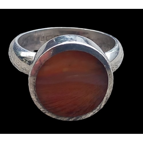 147 - A SILVER SEMI PRECIOUS SET RING