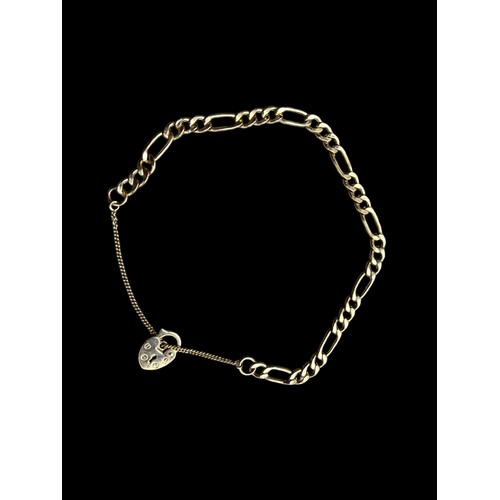 658 - A 9ct FLATLINK BRACELET WITH HEART LOCK AND SAFETY CHAIN