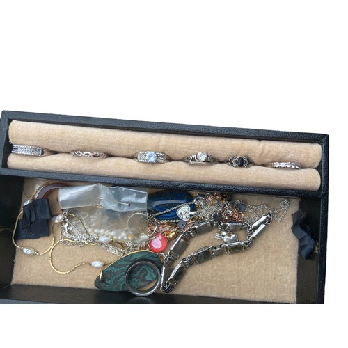 13 - A LEATHER JEWELLERY BOX AND CONTENTS