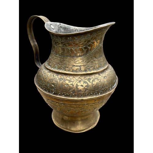 50 - AN ORNATE INDIAN BRASS WATER JUG