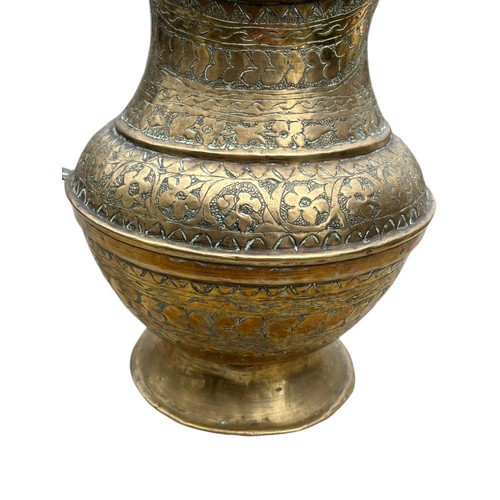 50 - AN ORNATE INDIAN BRASS WATER JUG