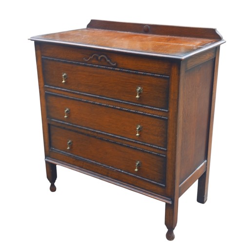 87 - AN OAK 3 DRAWER CHEST IN ARTS AND CRAFTS  STYLE