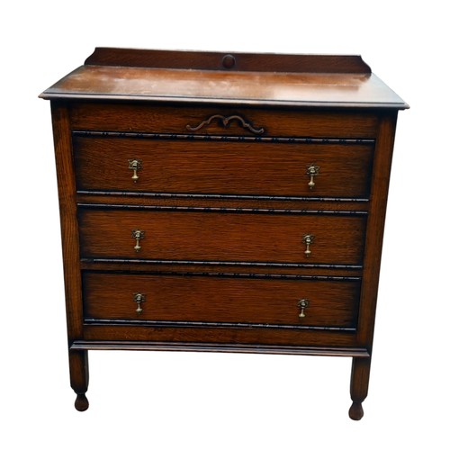 87 - AN OAK 3 DRAWER CHEST IN ARTS AND CRAFTS  STYLE