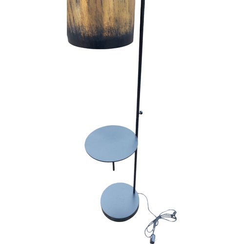 92 - A NEW BLACK STANDARD LAMP WITH WINE TABLE ATTACHED AND NEW GOLD AND BLACK SHADE