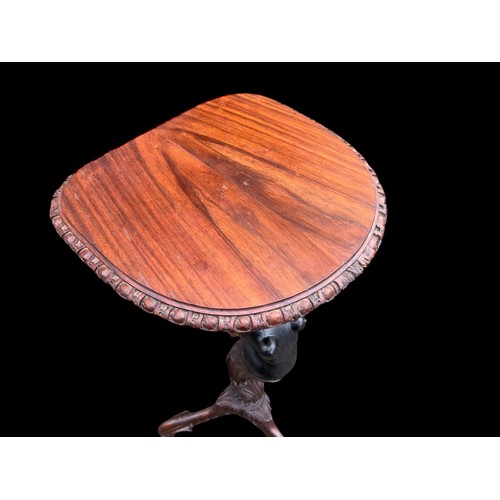 102 - PAIR OF CARVED FIGURE WALNUT TOP STANDS