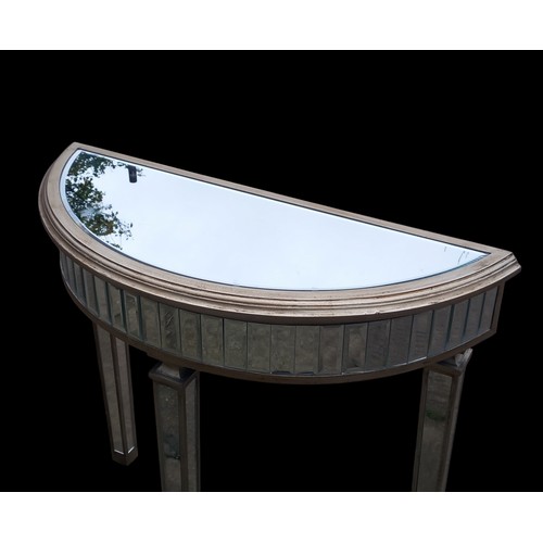 108 - A MIRRORED 1/2 MOON HALL TABLE