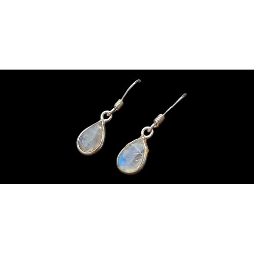 180 - A PAIR OF SILVER SET WITH MOONSTONES