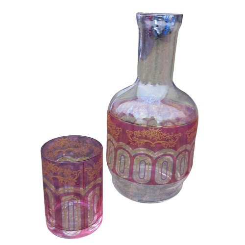 182 - A MIXED COLOUR PAIR OF CARAFES (FROM FULTONS)