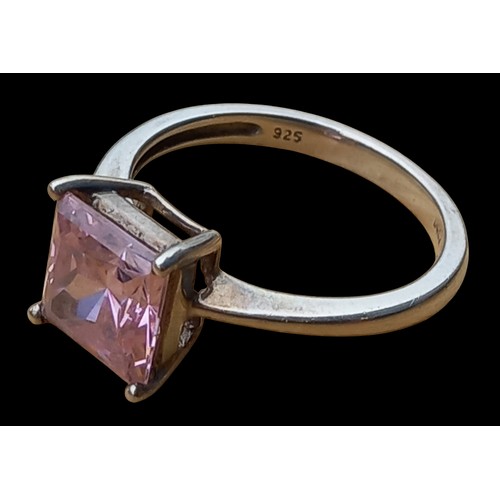 194 - A SILVER PINK TOPAZ RING SIZE 