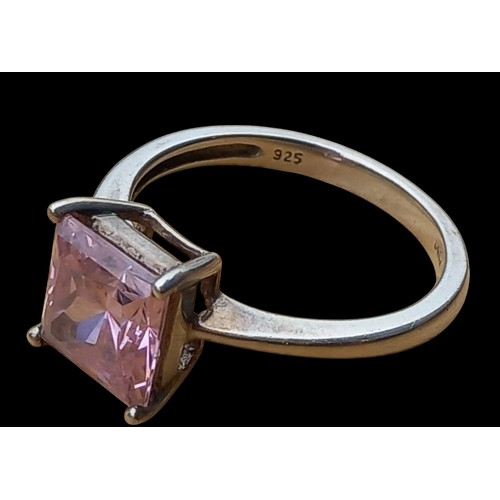 194 - A SILVER PINK TOPAZ RING SIZE 