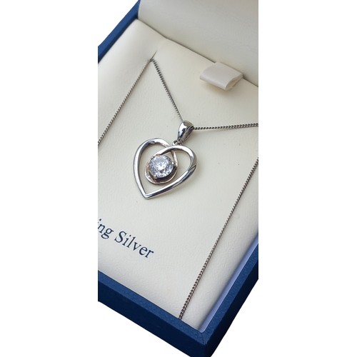 197 - A BEAUTIFUL SILVER HEART PENDANT WITH SOLITAIRE STONE ON SILVER CHAIN