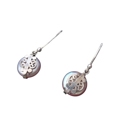 224 - A PAIR OF DECORATIVE SILVER OVERLAY EARRINGS