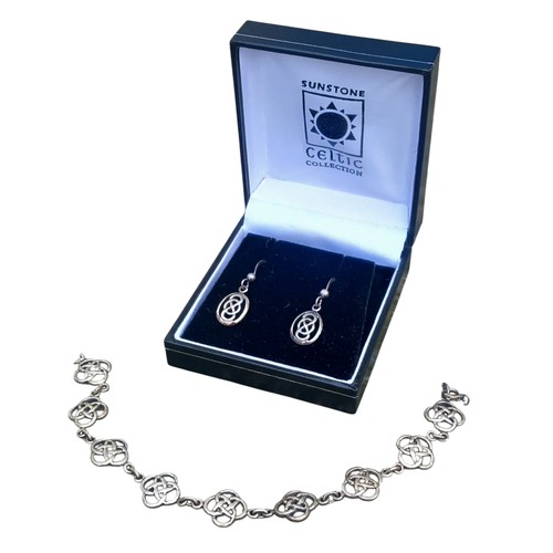 240 - A SILVER CELTIC DESIGN BRACELET AND MATCHING EARRINGS