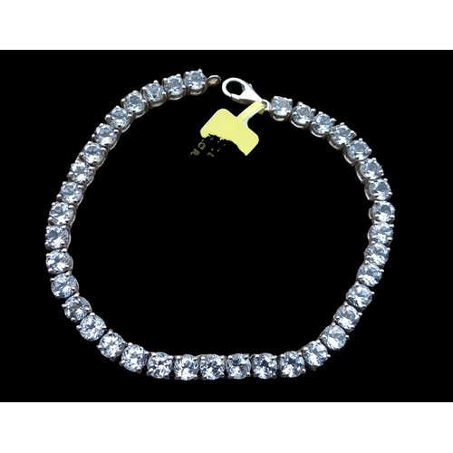 242 - A SILVER & WHITE CRYSTAL LINE BRACELET