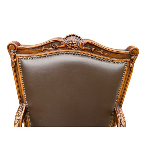 260 - PAIR OF MAHOGANY LEATHER ORNATE ARMCHAIRS