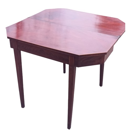 265 - A GEORGIAN MAHOGANY TURNOVER LEAF TABLE