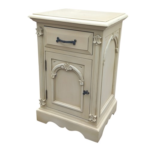 270 - A CREAM BEDSIDE WITH DRAWER OVER ARCHED PANEL DOOR